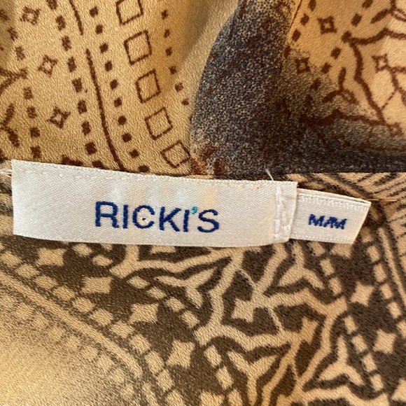 Ricki’s - Ladies blouse with a ruffles lace up neckline. Size. M - Picture 3 of 9